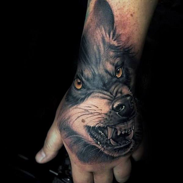 Cool Wolf Hand Tattoo