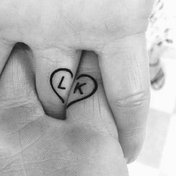 Heart initials couples tattoos