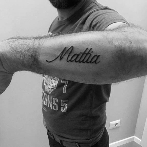 mattia outer forearm cursive guys name tattoos Outsons