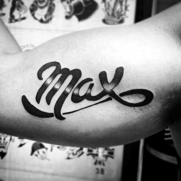 max shaded name bicep tattoo on male Outsons