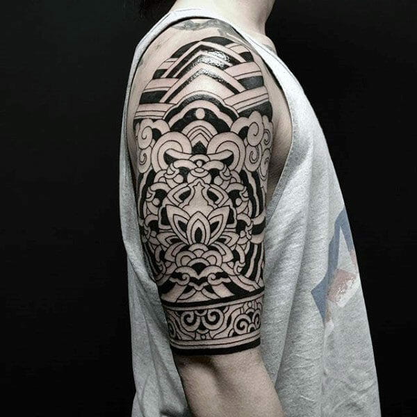Decorative Floral Tribal Arm Tattoo
