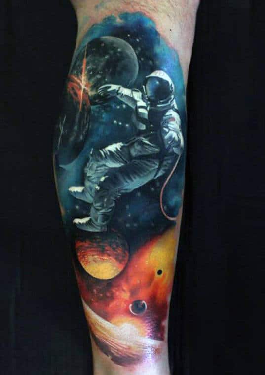 outer space leg tattoo