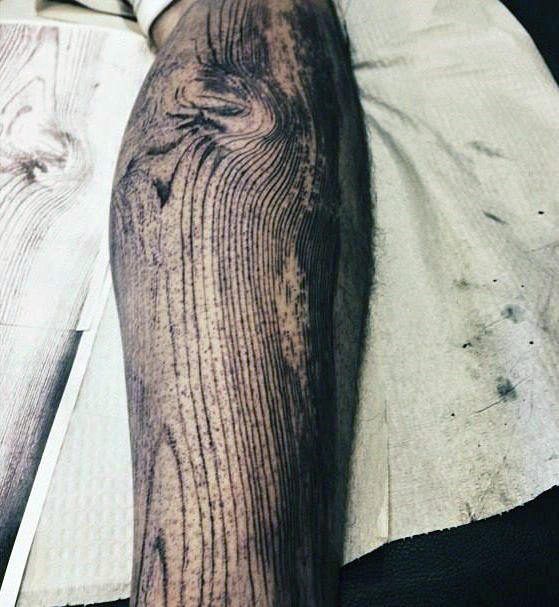 wood grain leg tattoo