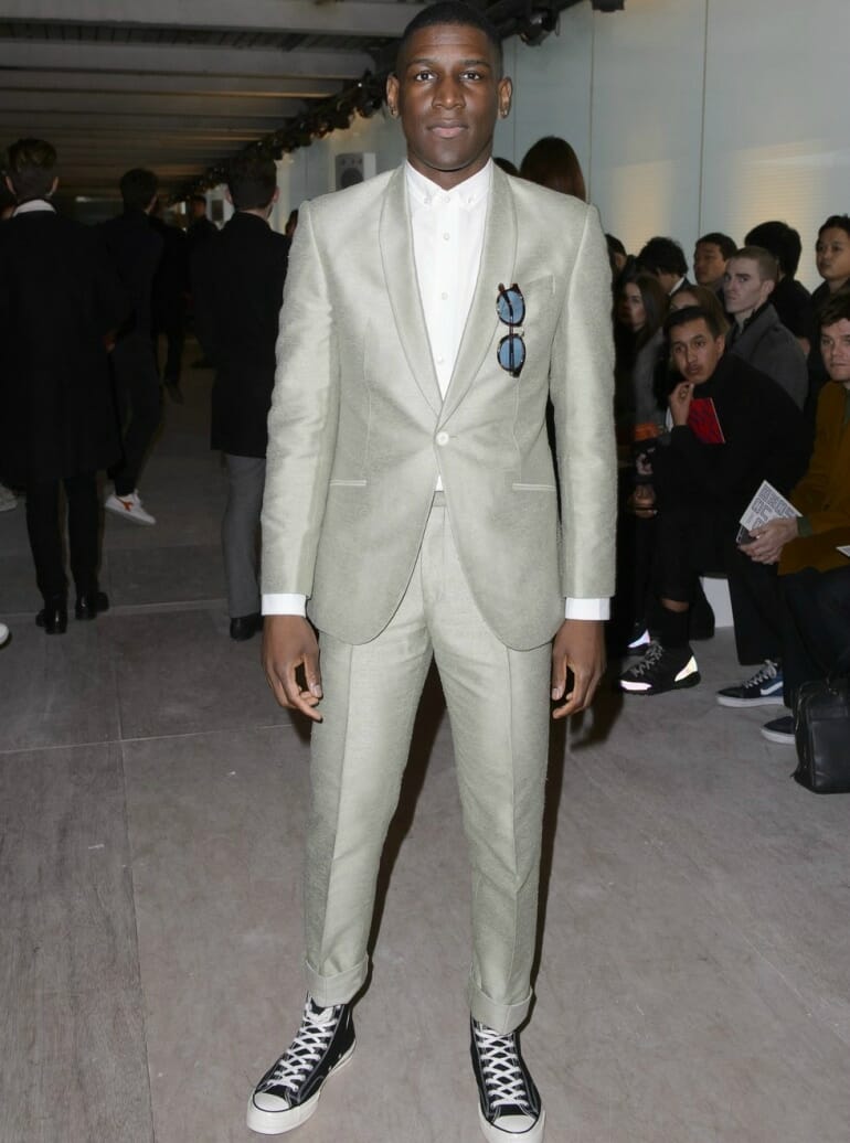 labrinth wearing a suit with converse