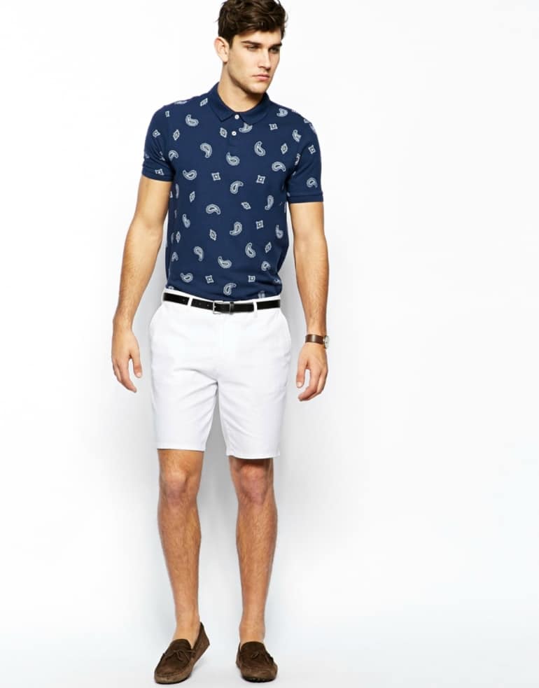 man in white shorts and loafers