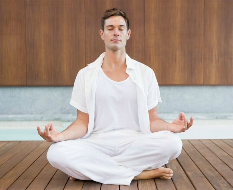 man-meditating-reducing-stress