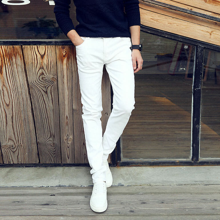 mens street style navy blue jumper white jeans white trainers