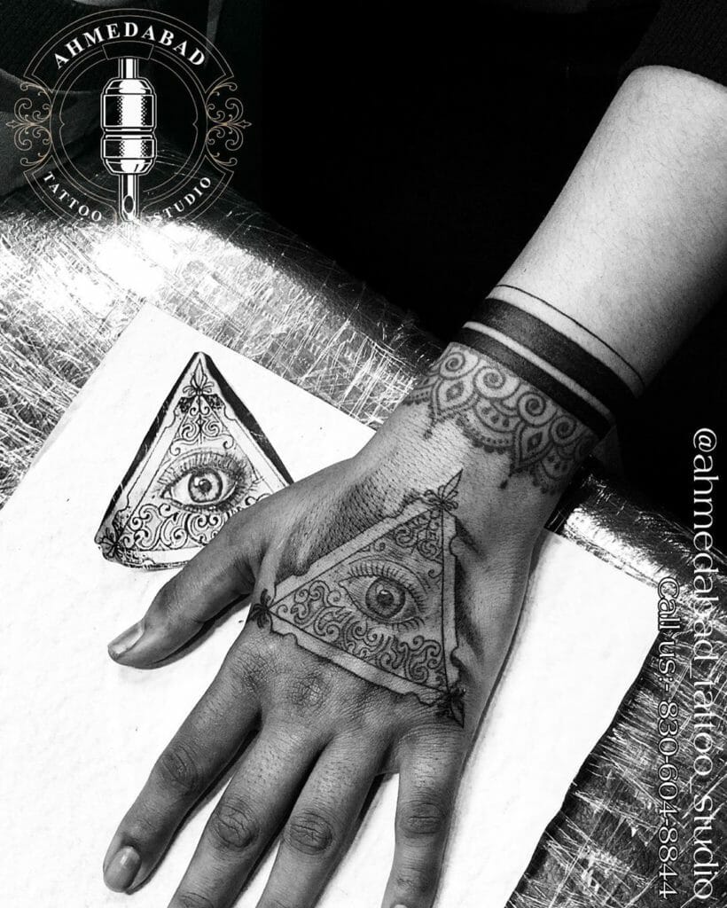 Hand Illuminati triangle tattoo meaning Outsons