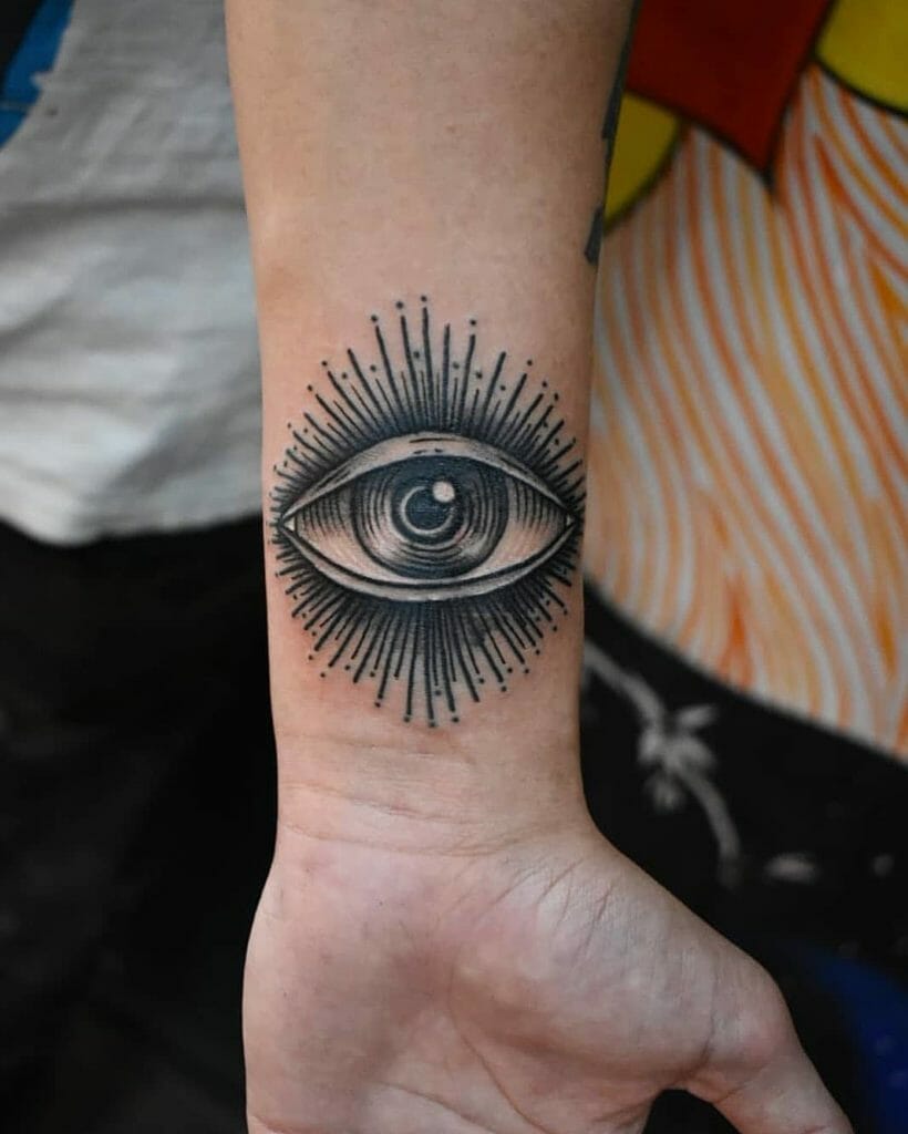 Small black eye illuminati tattoo design Outsons