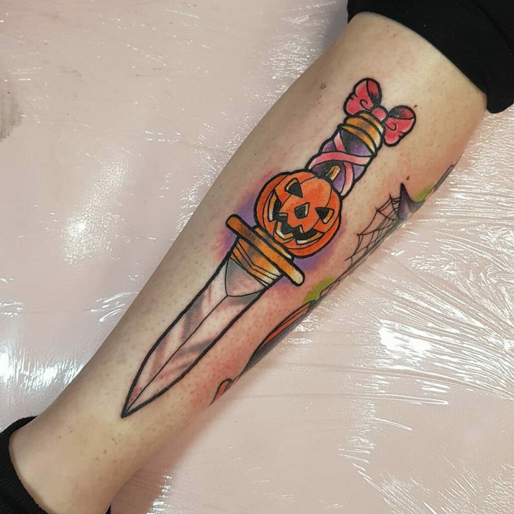 Spooky traditional dagger tattoo Outsons
