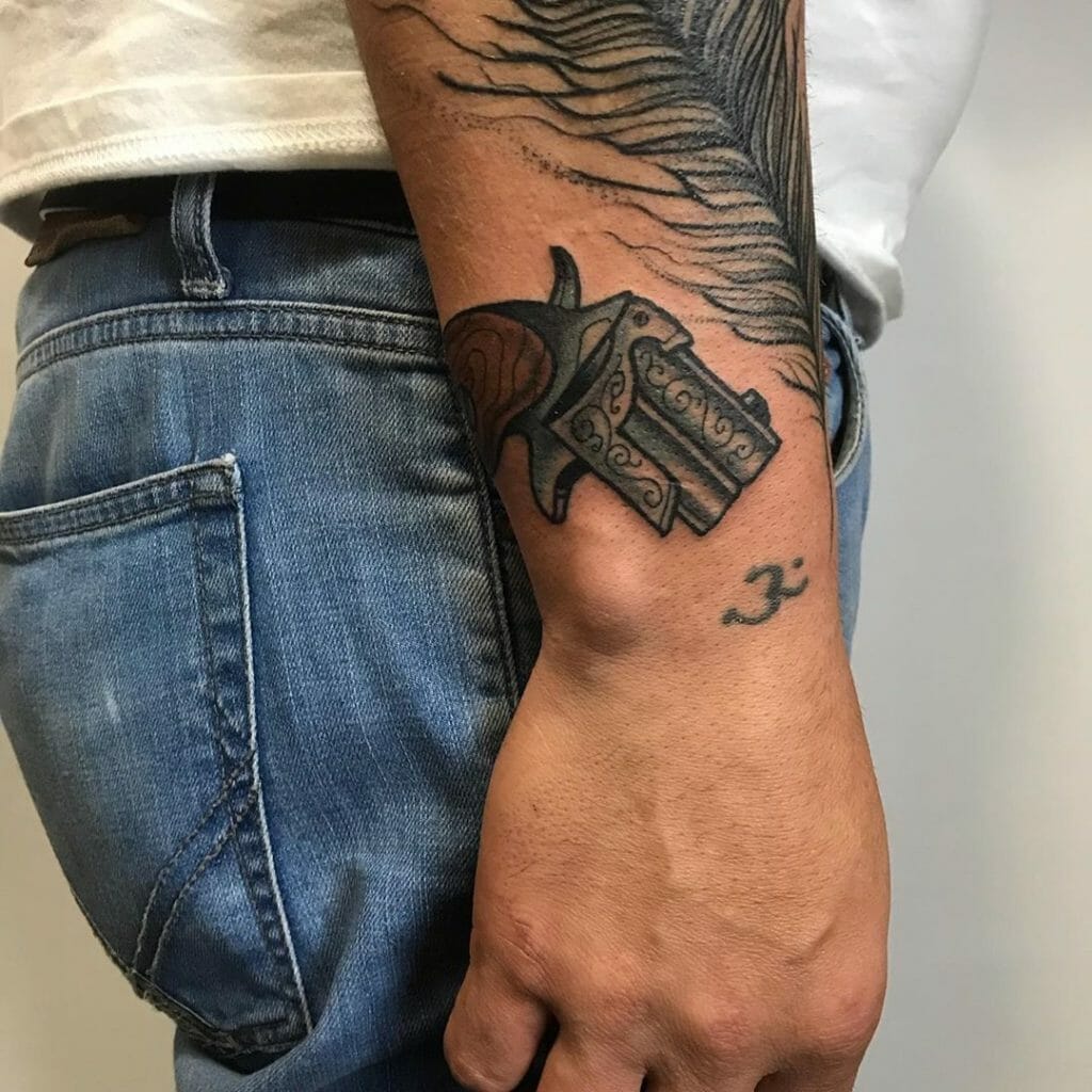 Gun tattoos1