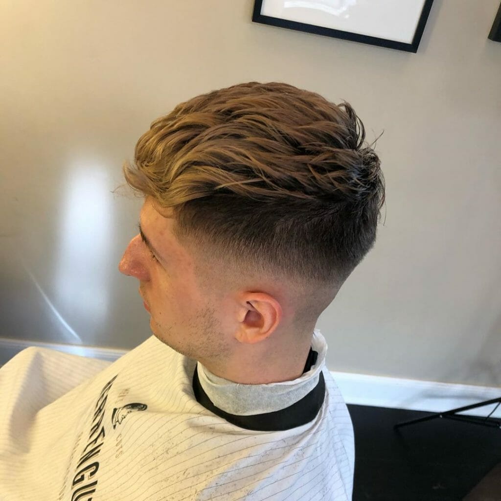 Wavy mid pompadour fade haircuts