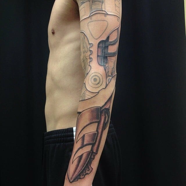 robot arm tattoo