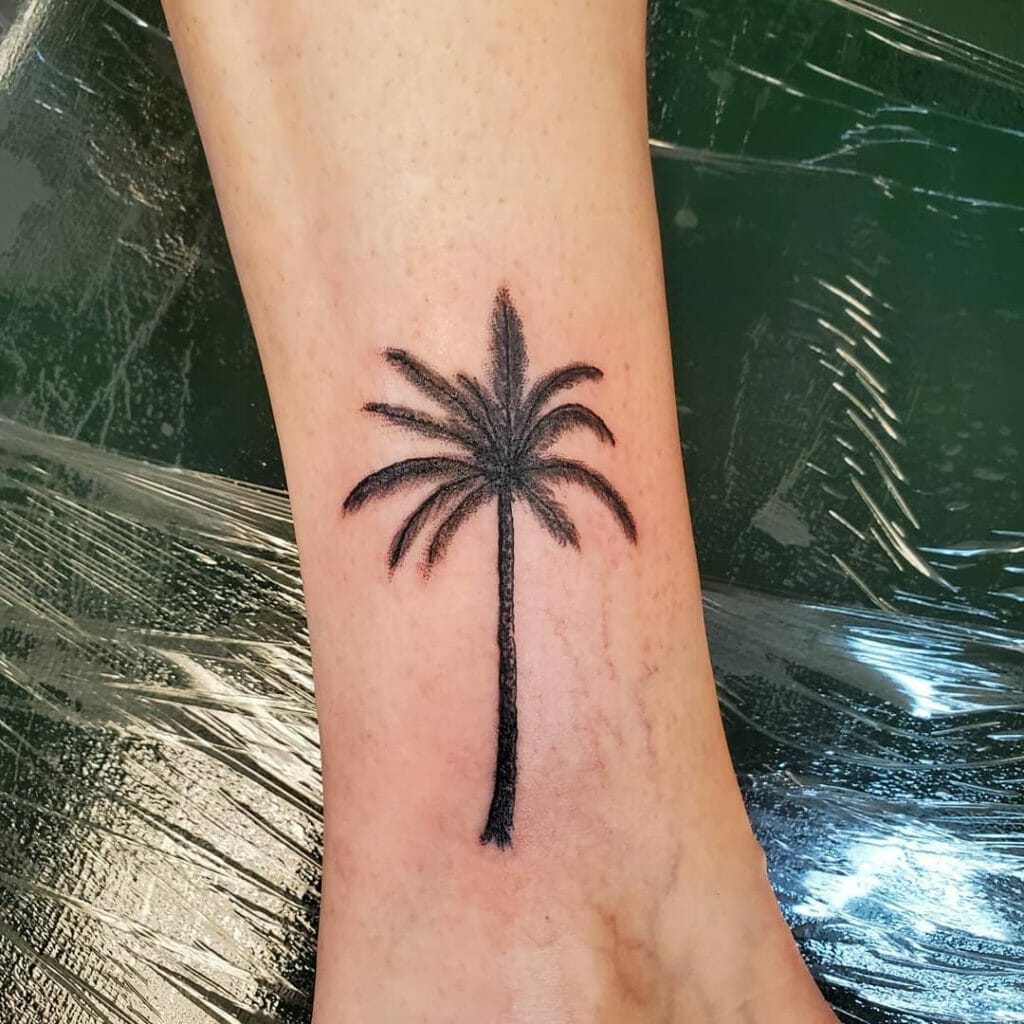 Black And Grey Palm Tree Tattoo