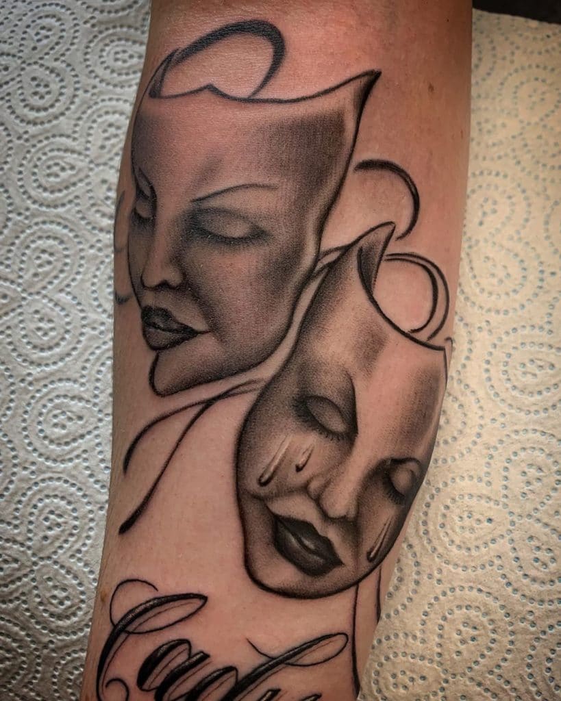 2 faces kissing tattoo