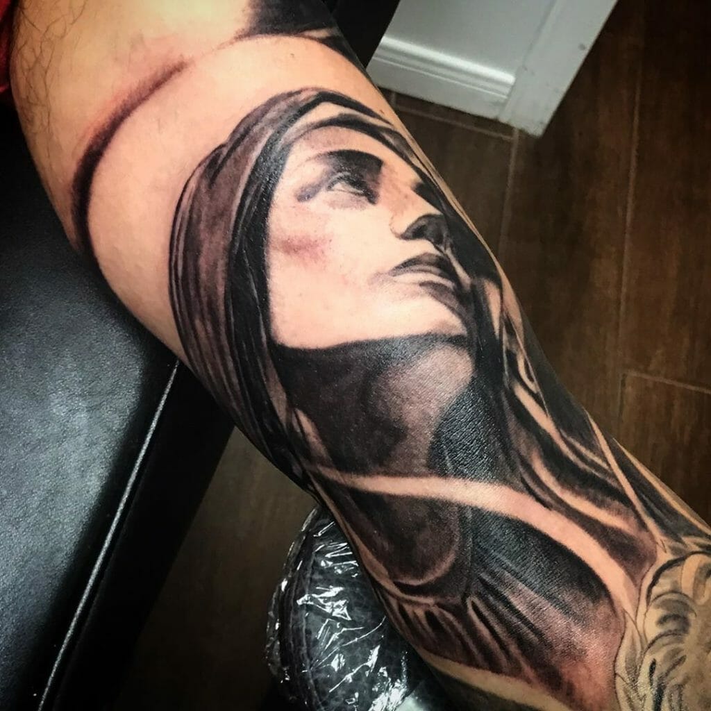virgin mary tatto
