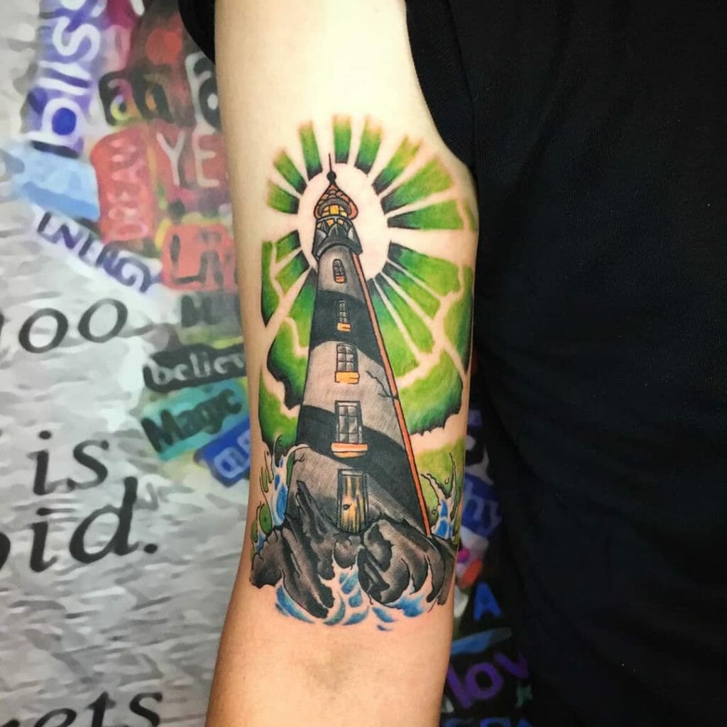 Lighthouse Traditional Tattoo With Green Elements Outsons