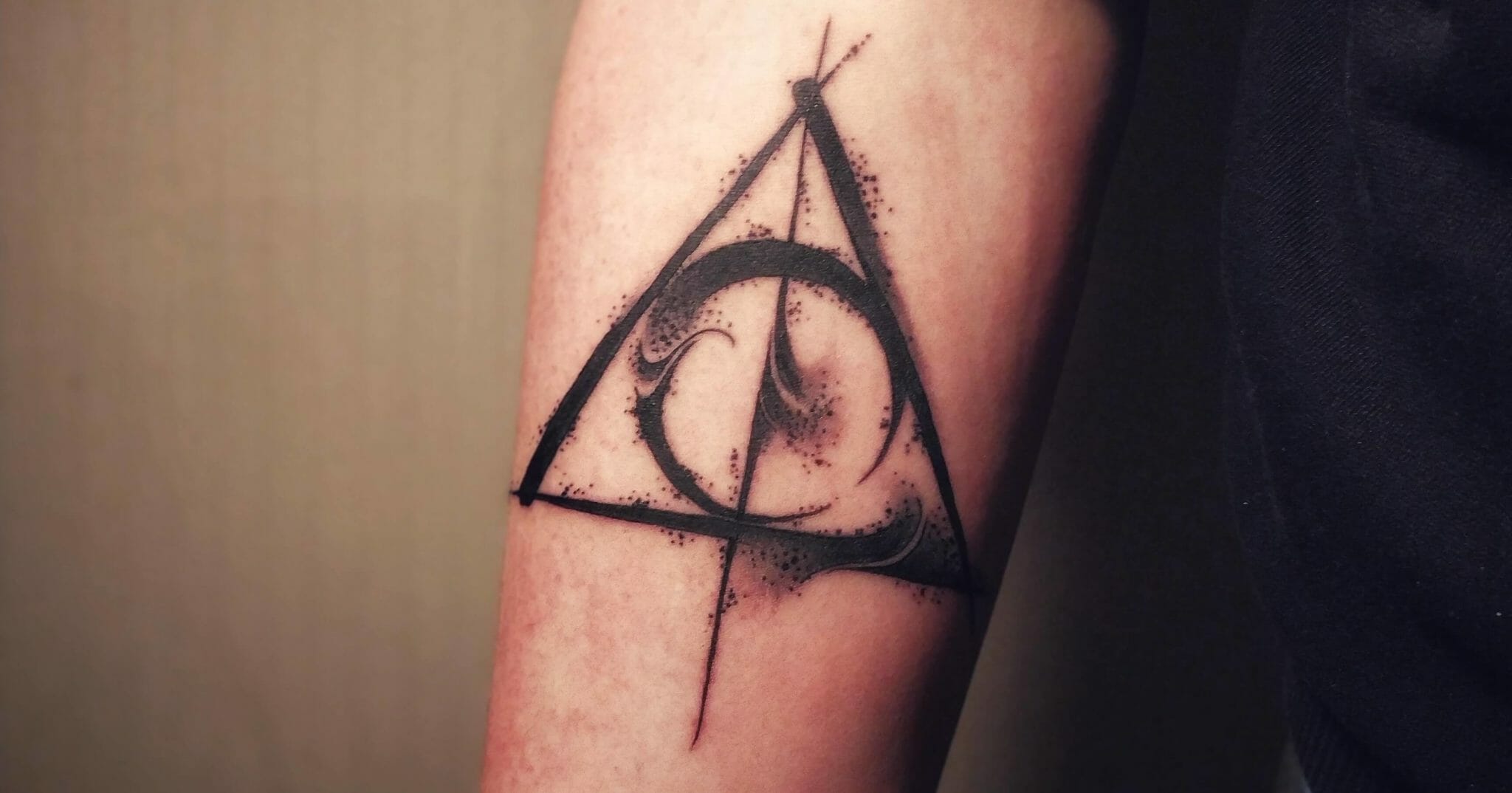 1. "Deathly Hallows symbol tattoo" - wide 1