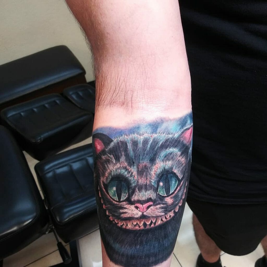 Big Cheshire Cat Forearm Tattoo