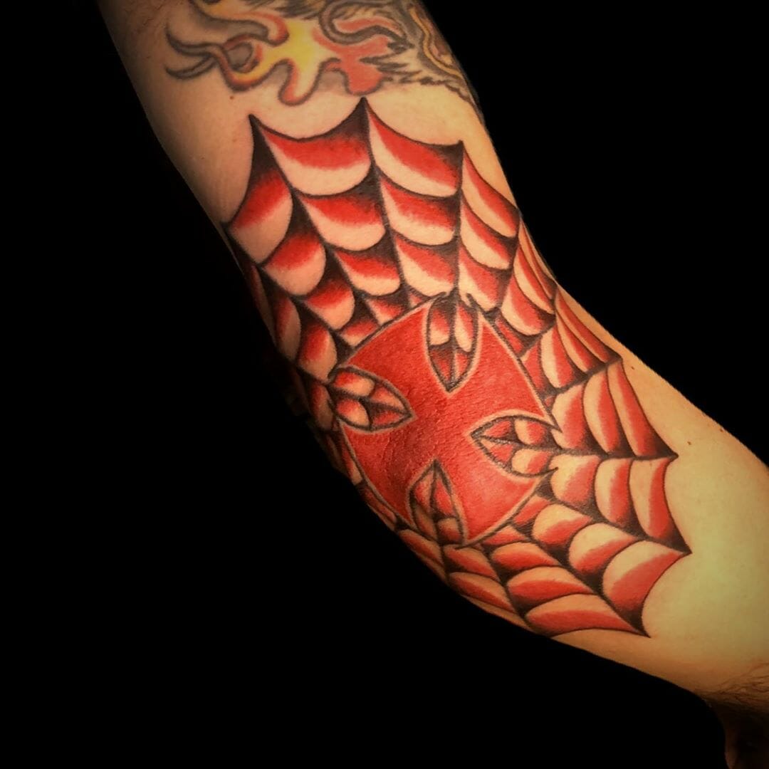 Big Red Elbow German Cross Tattoo