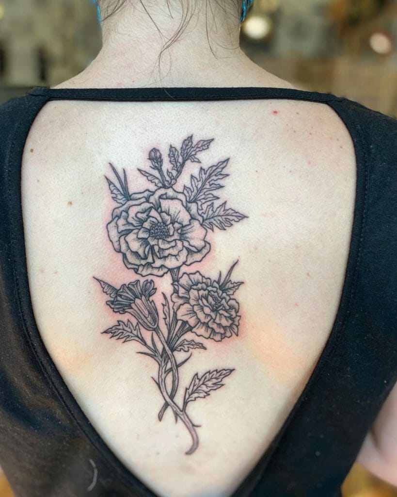 Black Ink Marigolds Tattoo
