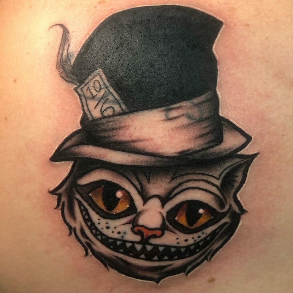 Black and White Cheshire Cat With Hat Tattoo