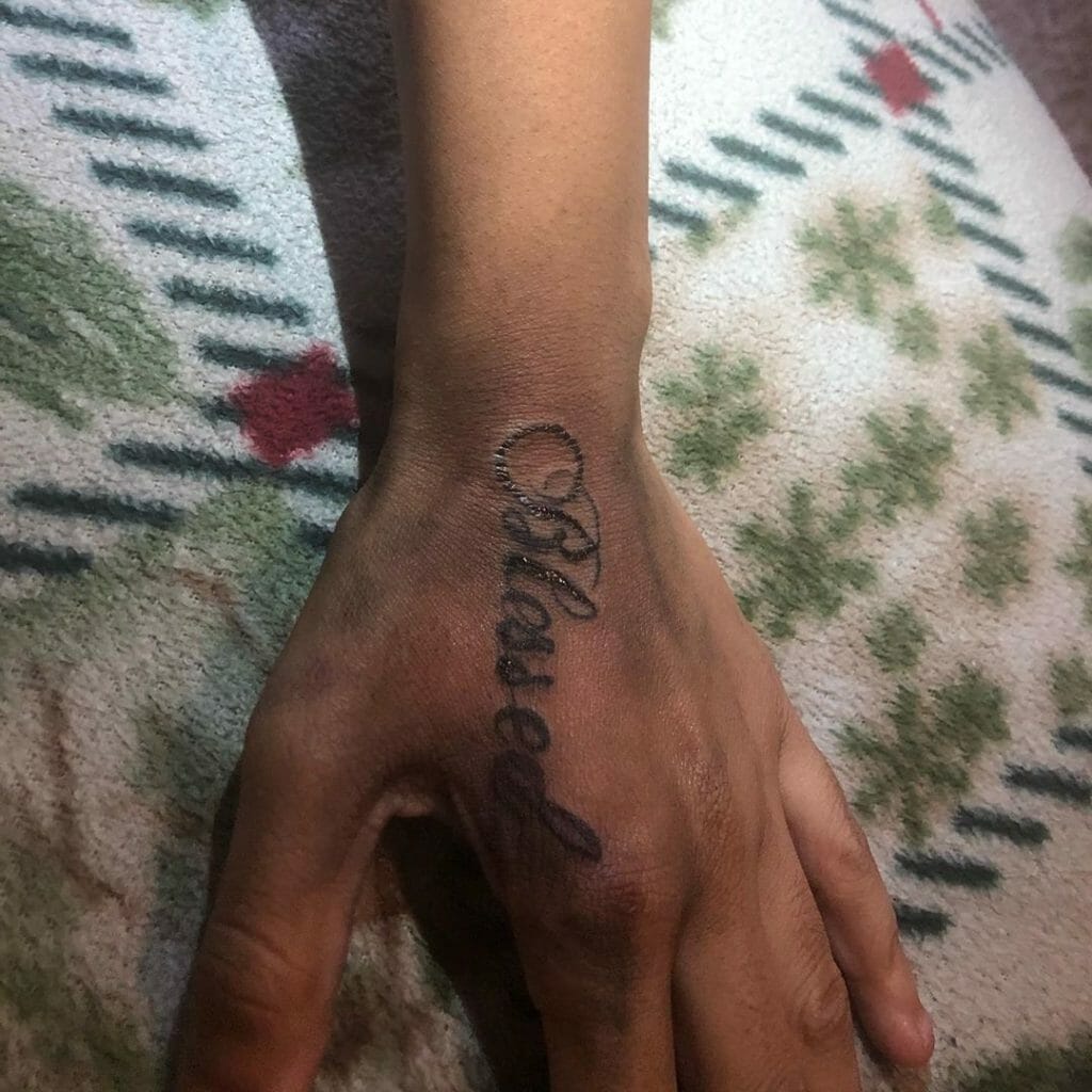 Blessed Letter Tattoo On The Hand