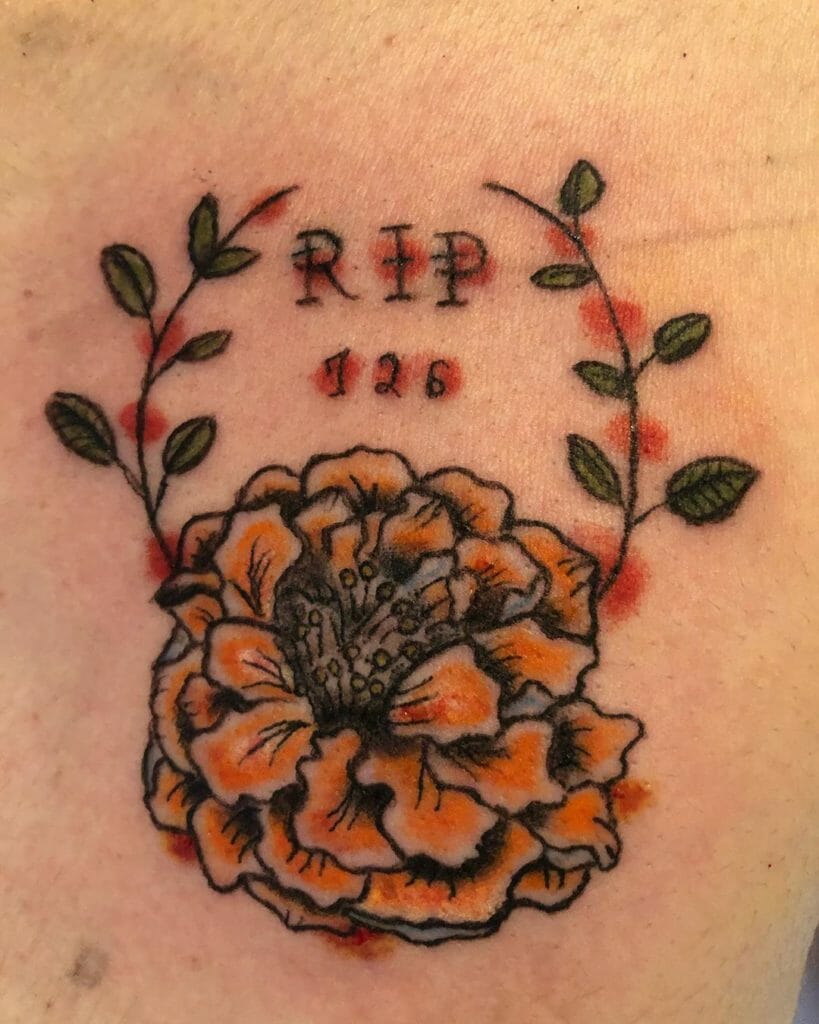 Commemoration Marigold Flower Tattoo