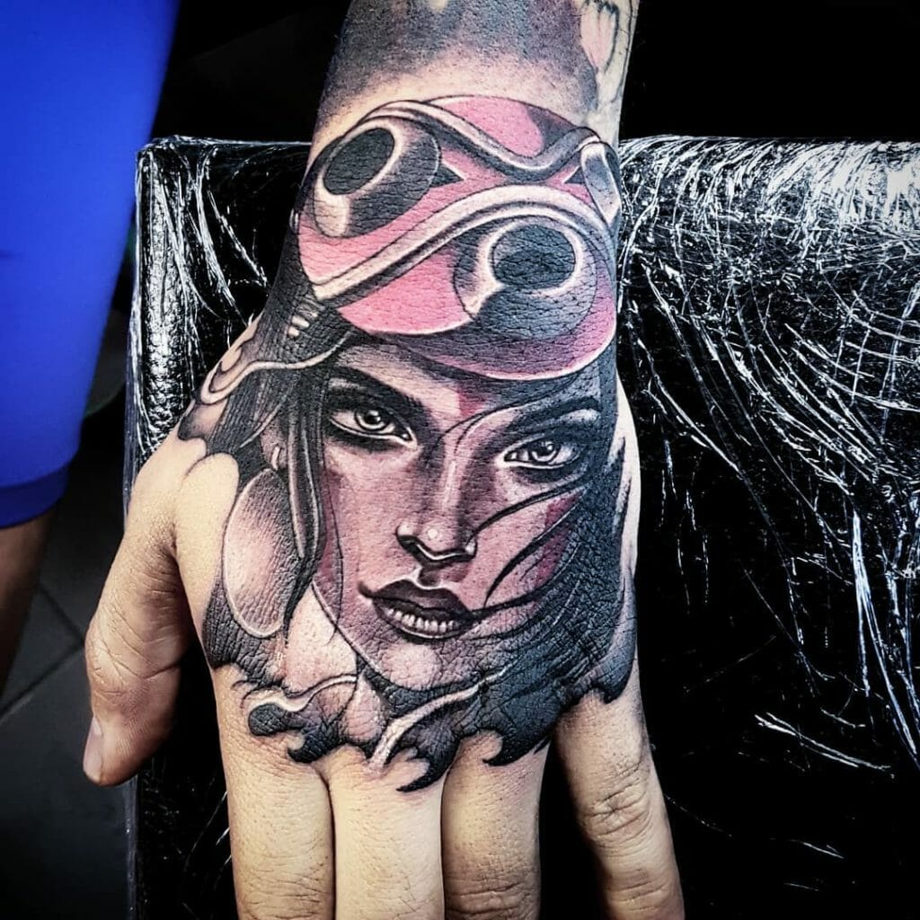 Dark And Big Princess Mononoke Tattoo On The Hand