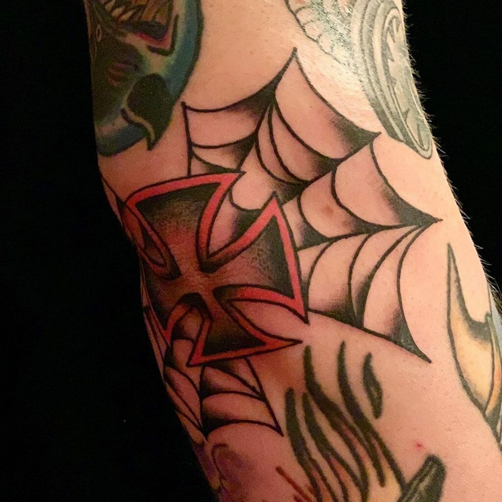 Elbow Black And Red German Iron Cross Tattoo