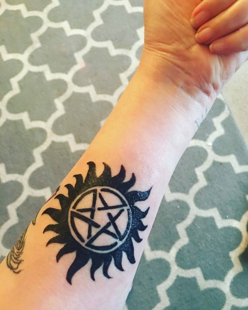Forearm Anti Possession Symbol Tattoo