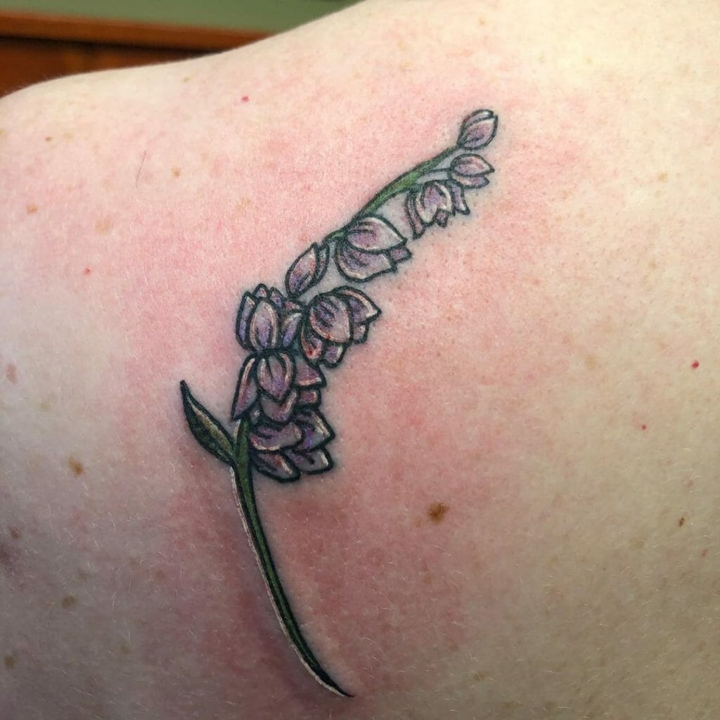 Lily Of The Valley Back Tattoo