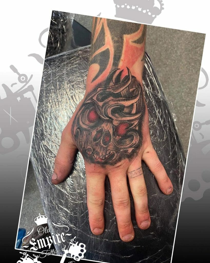 Skull Tattoo In Hand Design