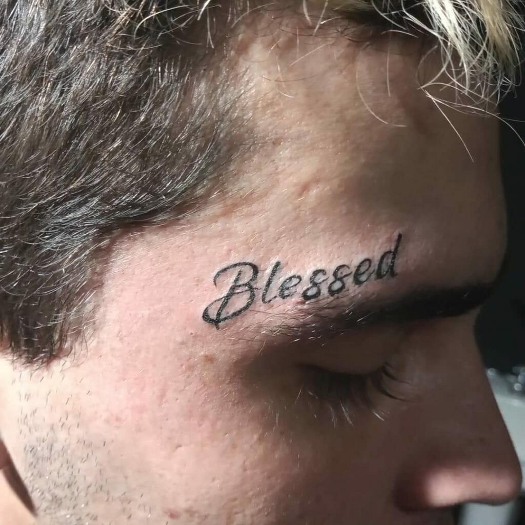Truly Blessed Tattoo Above The Eyebrow