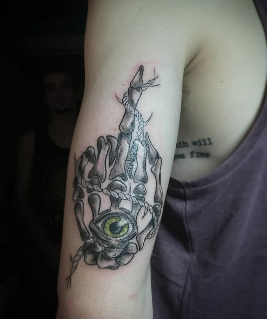 skull hand tattoo