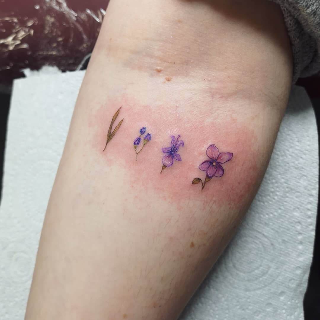 Beautiful Meaningful Violets Flower Tattoo