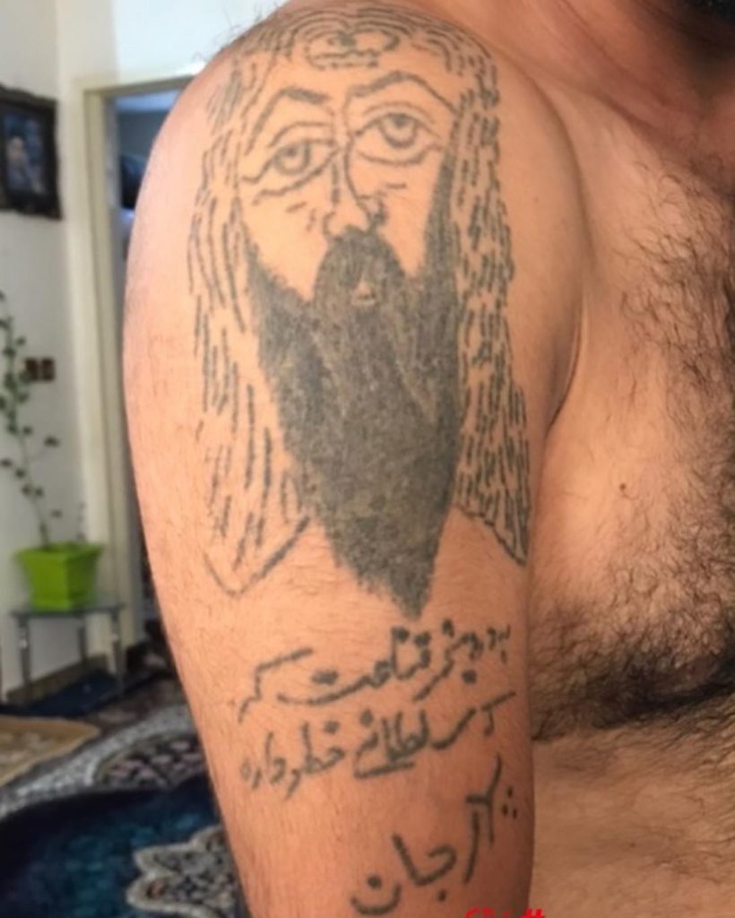 Black Ink Religious Tattoo