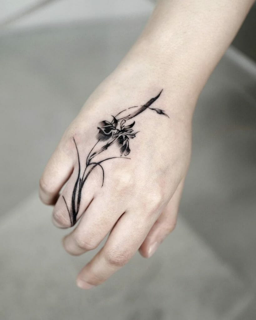 Black and Gray Iris Image Tattoo