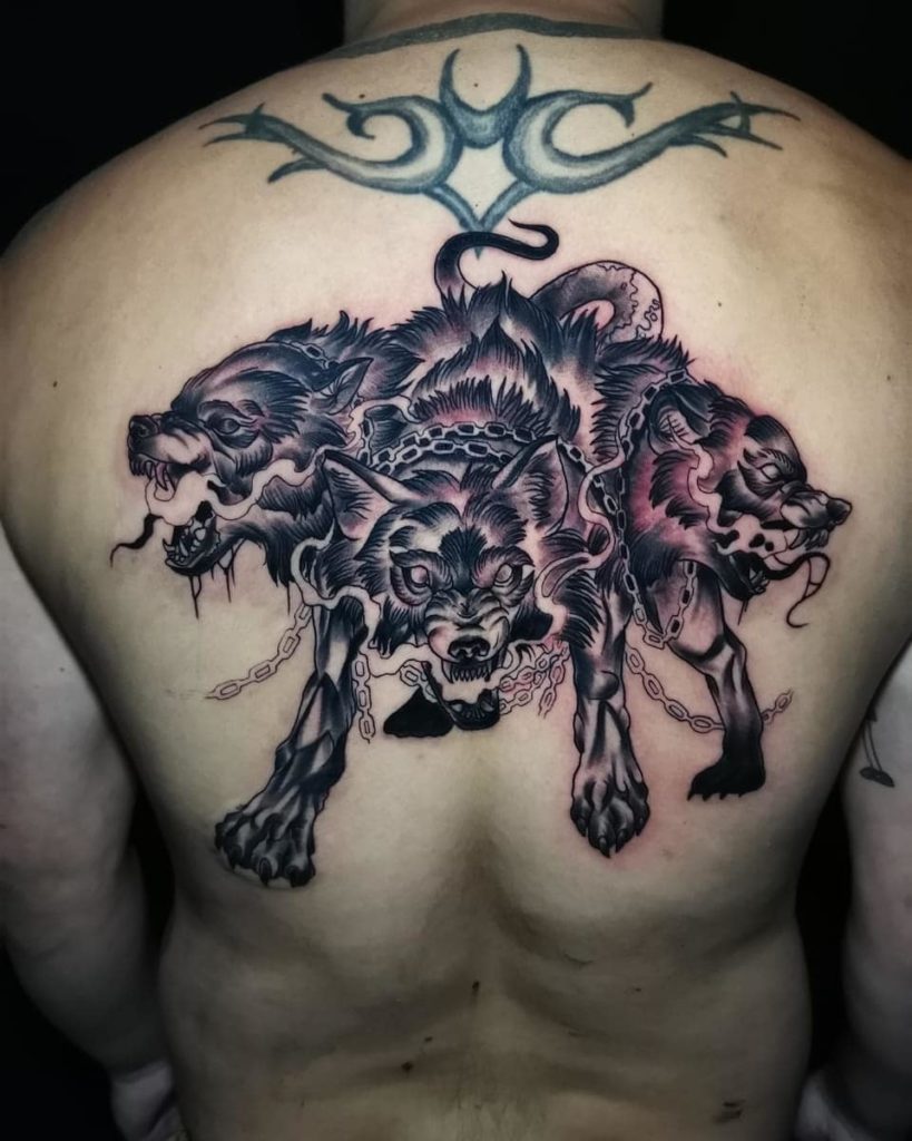 Cool Chained Up Three Headed Dog Tattoo