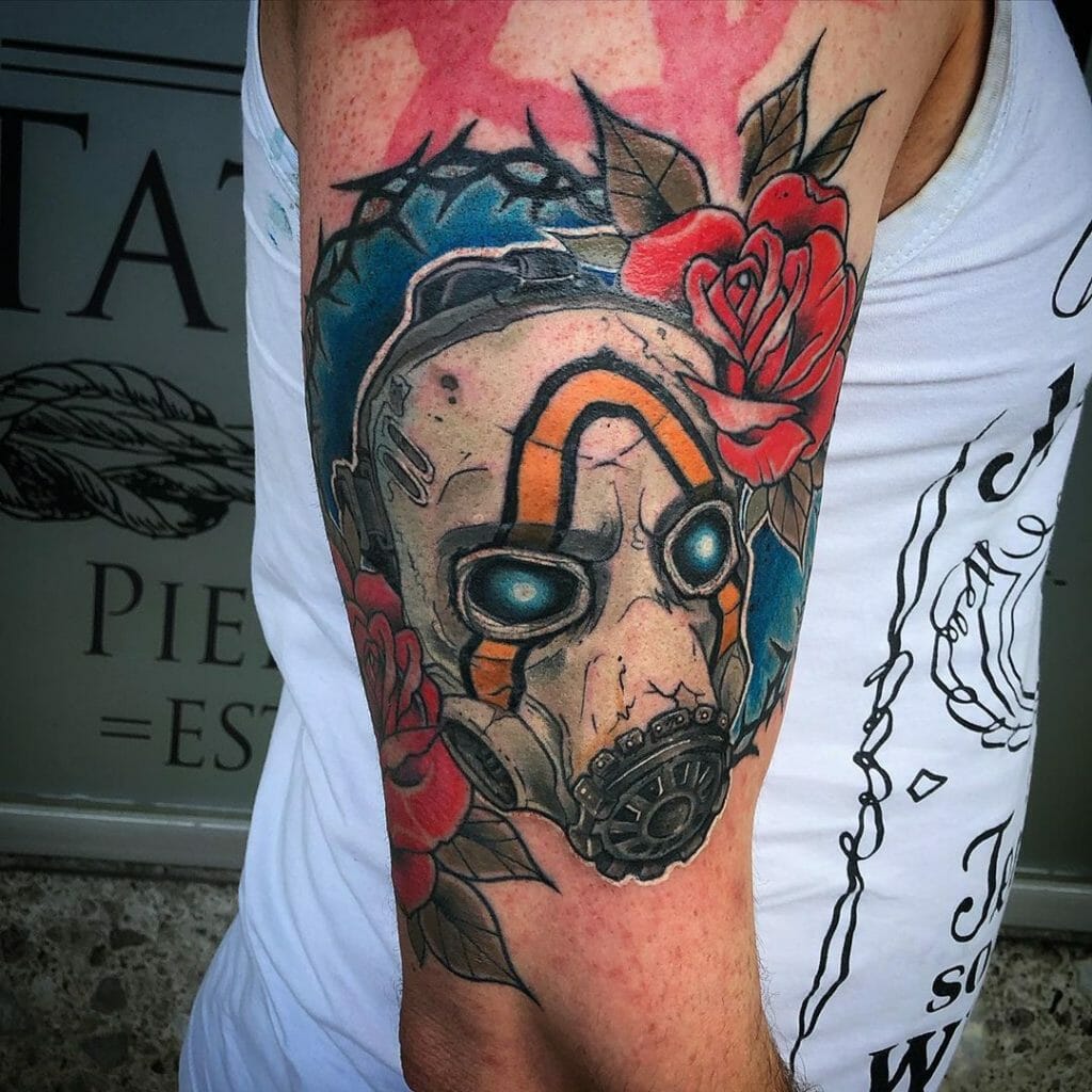 Full Color Upper Arm Borderlands 2 Mask With Vault Symbol Tattoo Ideas