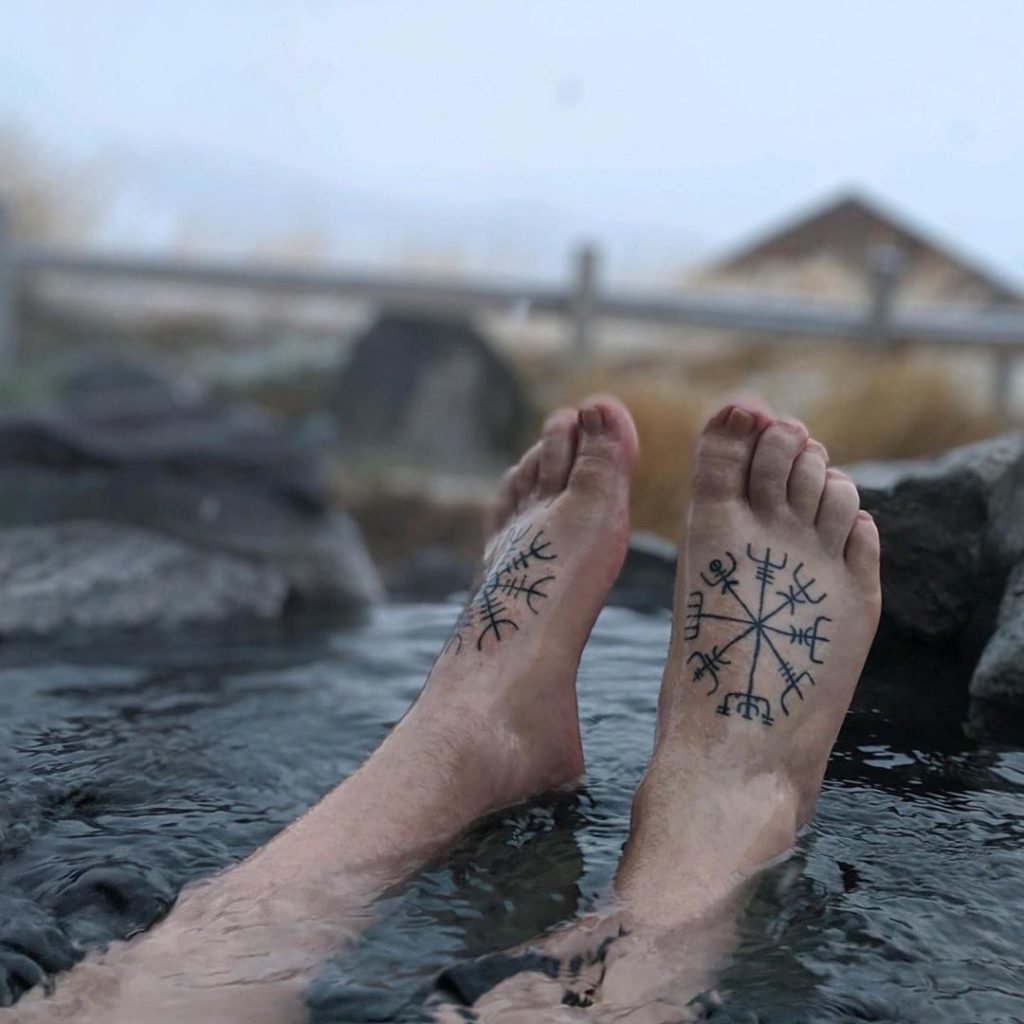Matching Vegvisir And Helm Of Awe Black Ink Foot Tattoo