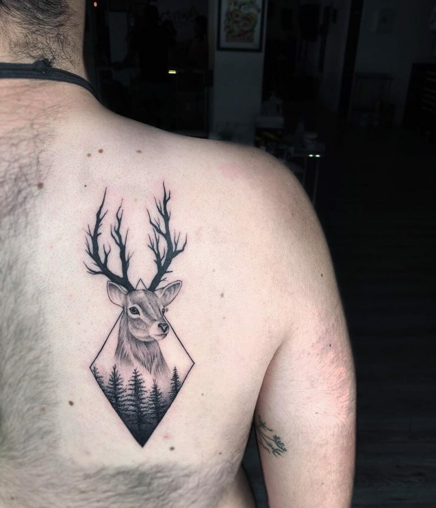 Realistic Small Back Forest Tribal Deer Tattoo