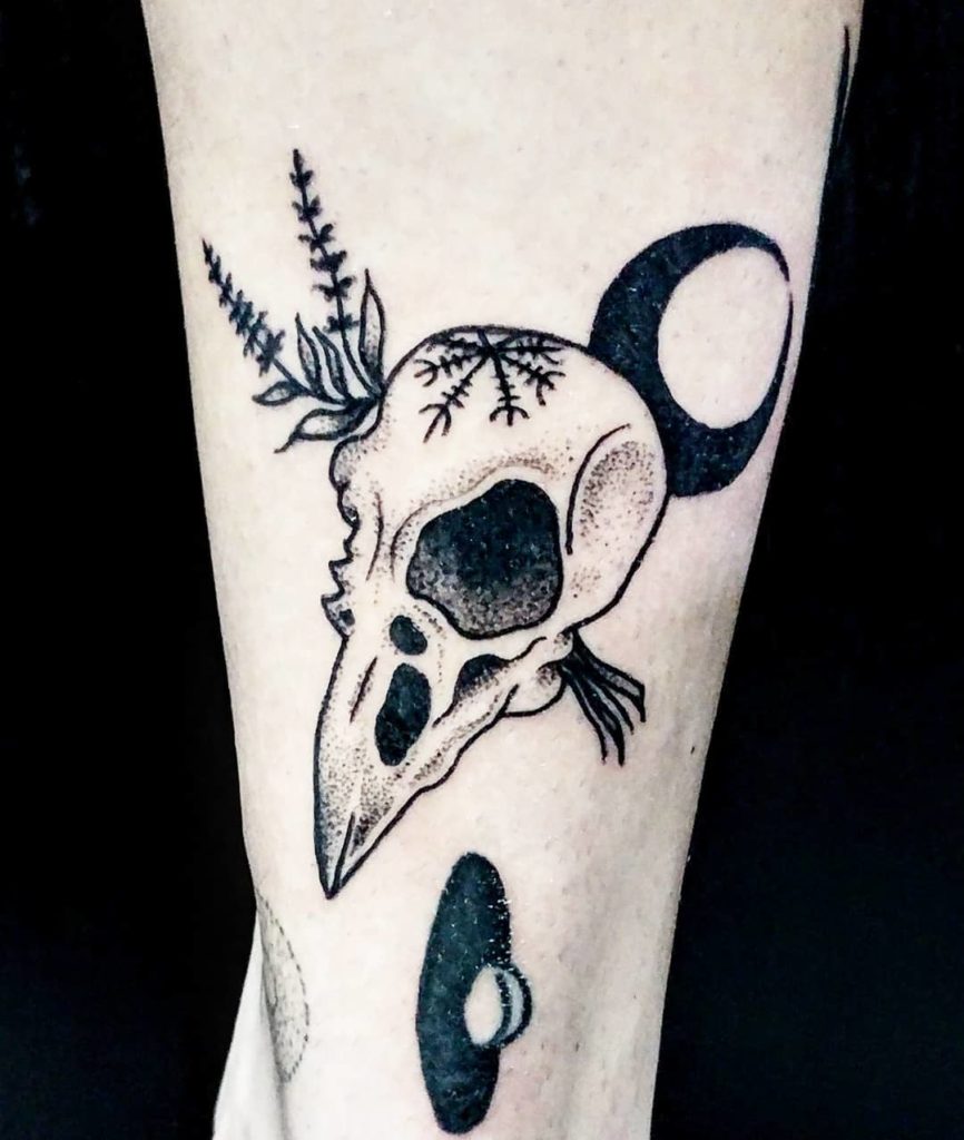 Unique Raven Skull With Helm Of Awe Tattoo