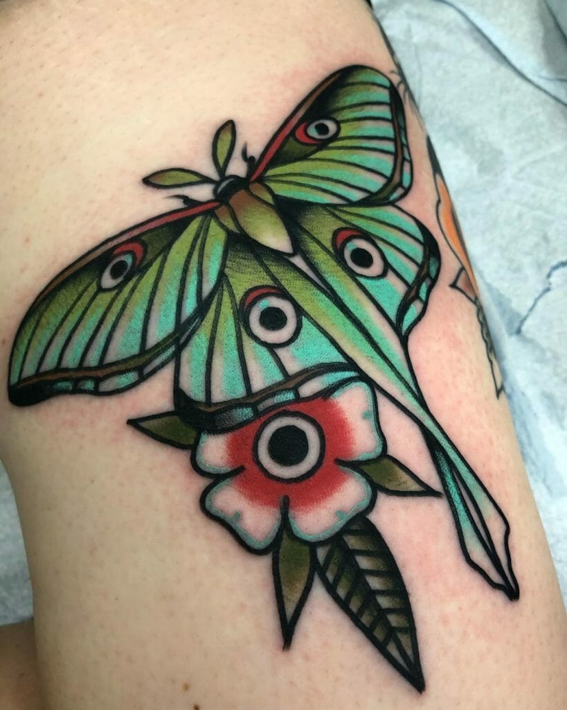 Vibrant Luna Moth Tattoo With Flower Designs
