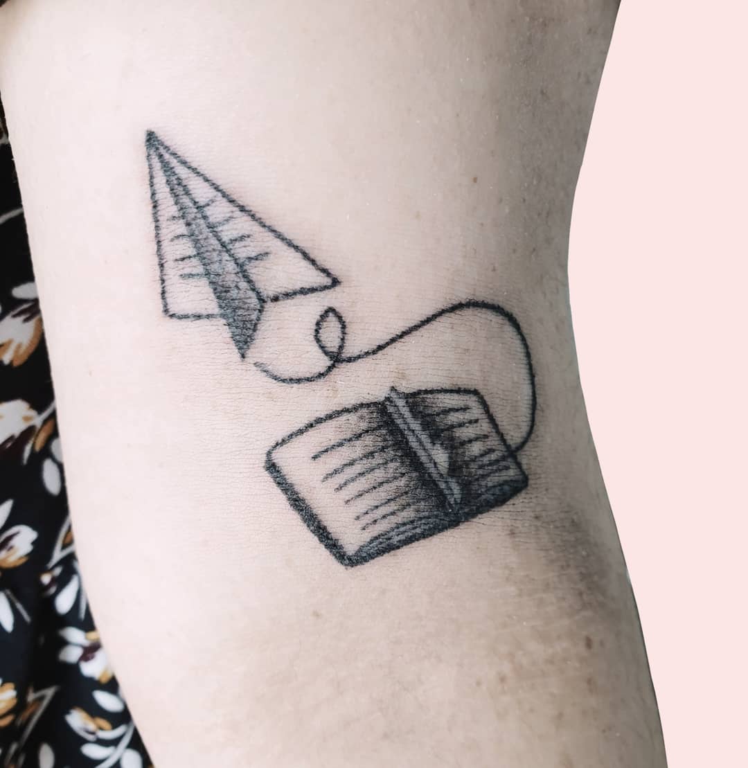 Writer's Freedom Book and Paper Plane Tattoo Small Design