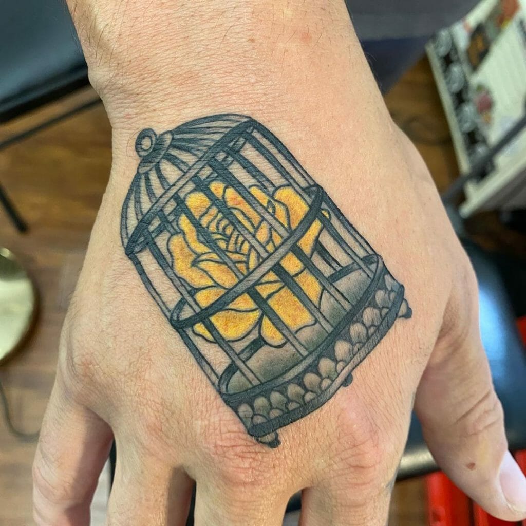 Yellow Rose In A Birdcage Hand Men Tattoo