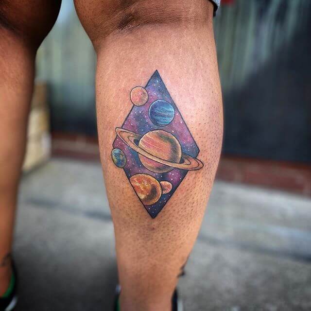 Colorful Space And Planet Saturn Tattoo