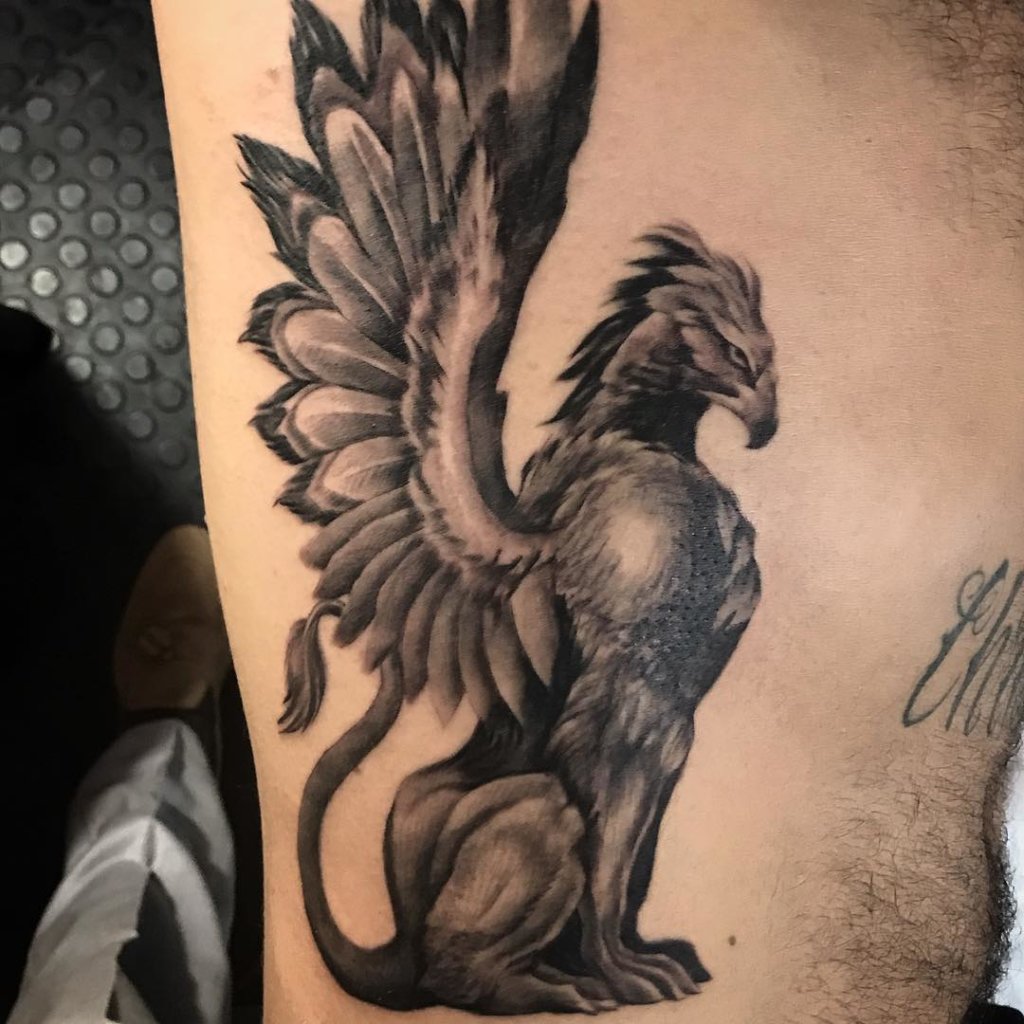 Black And White Simple Griffin Tattoo