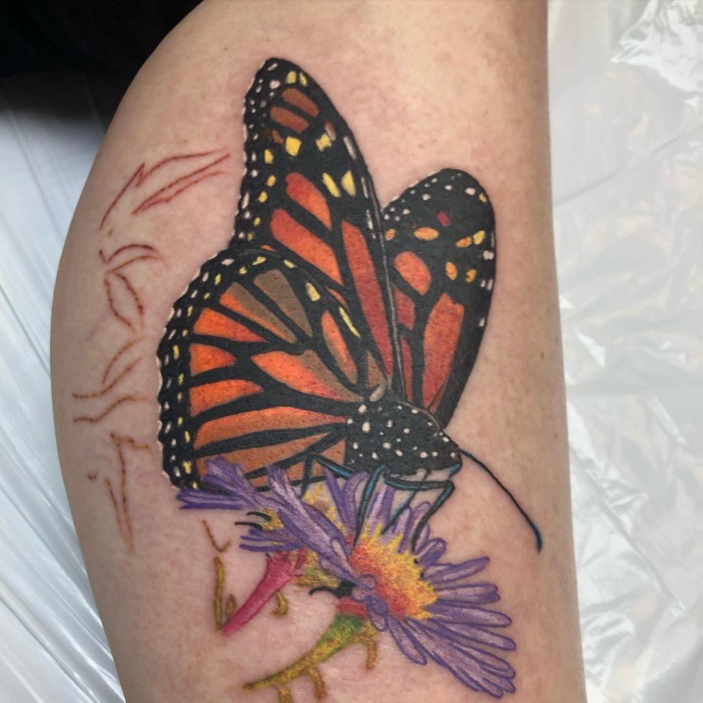 Bright And Colorful Monarch Butterfly Tattoo Designs