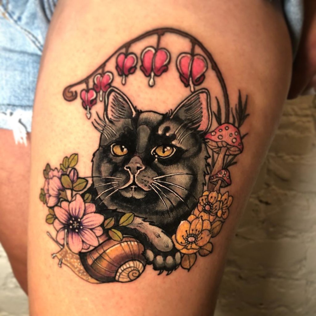 Cat Inspired Bleeding Heart Tattoo